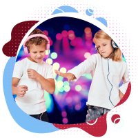 two kids dancing with headsets